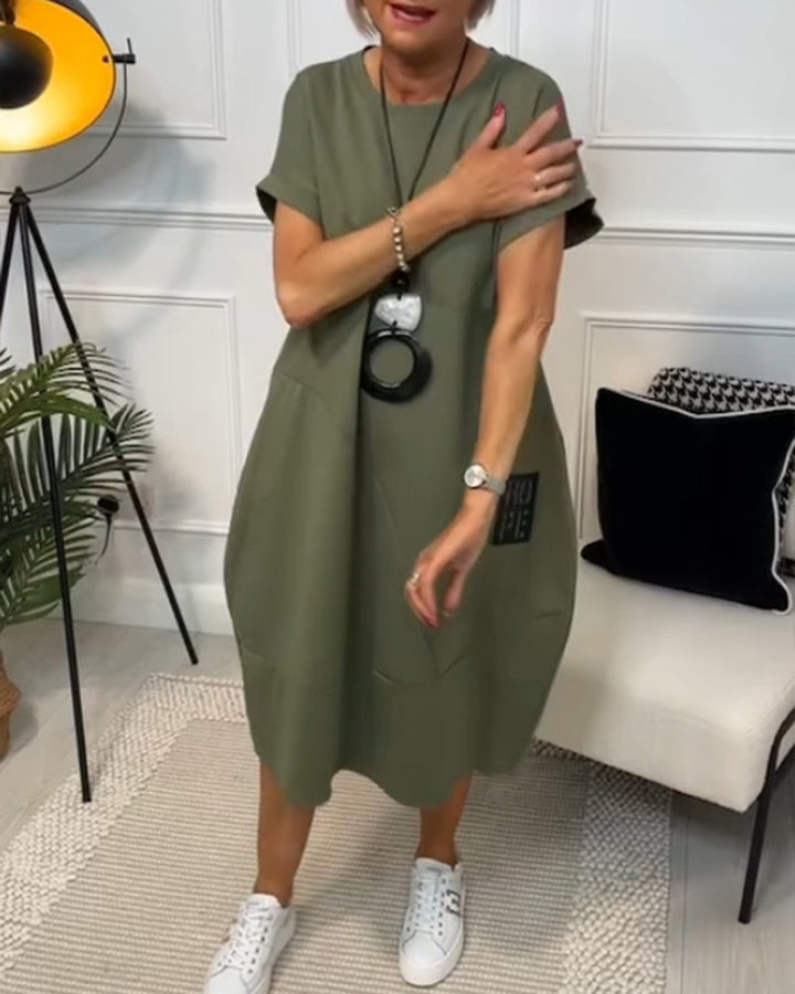 Paige | Effortless Short Sleeve Black Midi Dress With Pockets