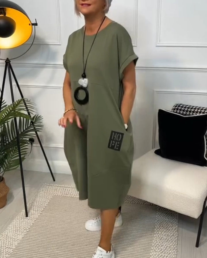 Paige | Effortless Short Sleeve Black Midi Dress With Pockets