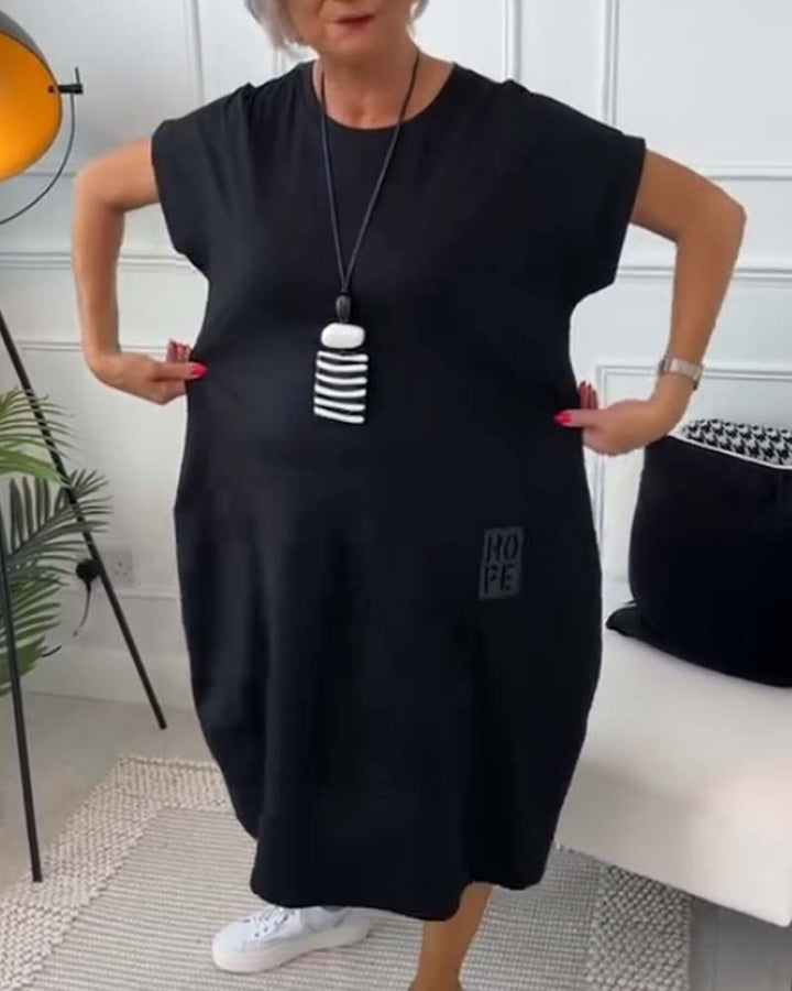 Paige | Effortless Short Sleeve Black Midi Dress With Pockets