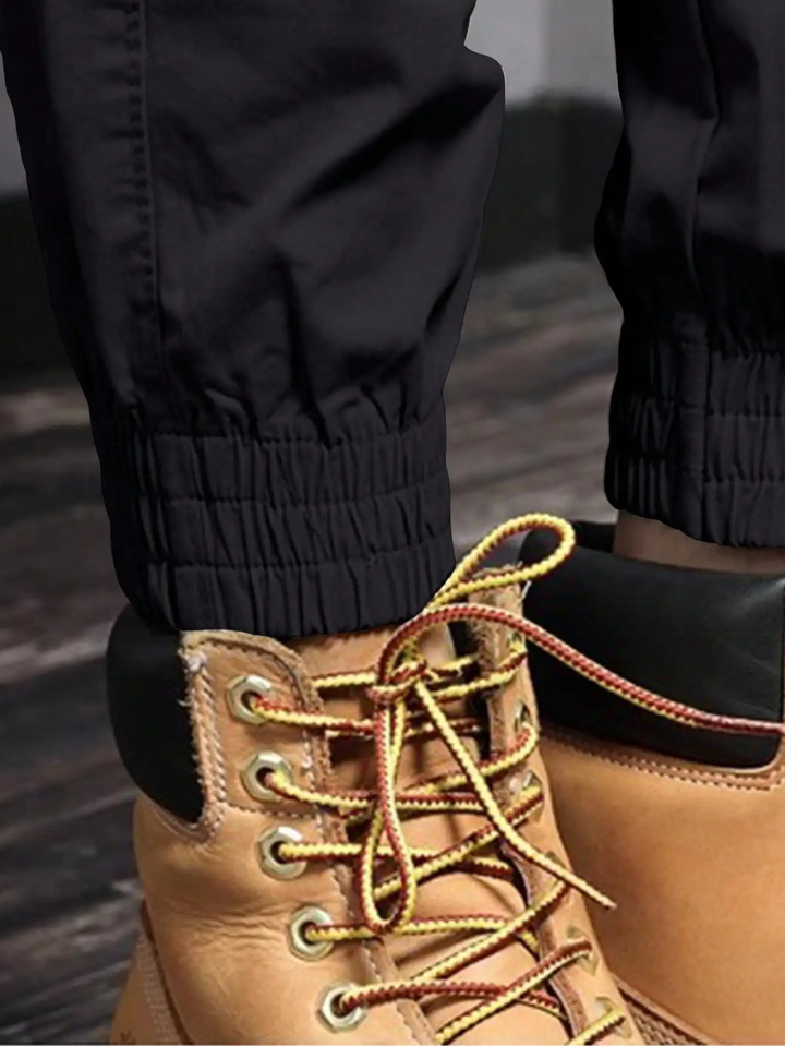 Evy | Sleek Tapered Cargo Trousers With Multi-Pocket Utility Design