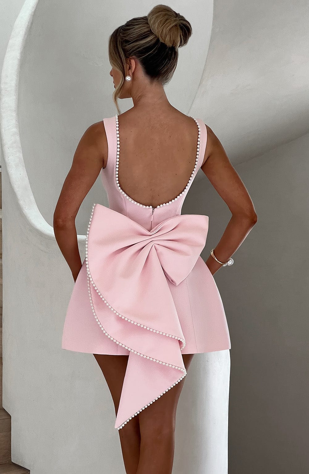 Sybil | Elegant Sleeveless A-Line Mini Dress With Bow Back Detail