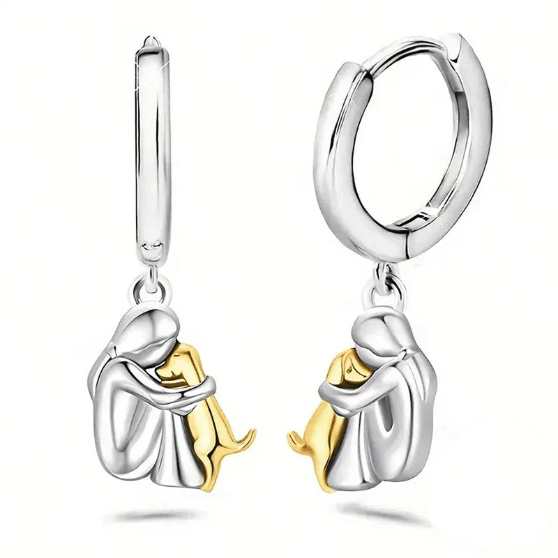 Margot | Elegant Dog Embrace Silver Huggie Hoop Earrings