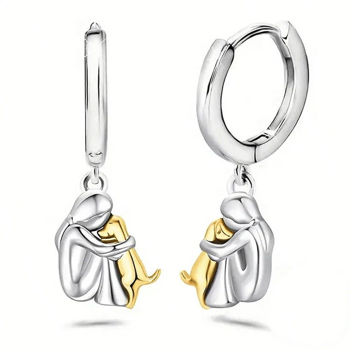 Margot | Elegant Dog Embrace Silver Huggie Hoop Earrings