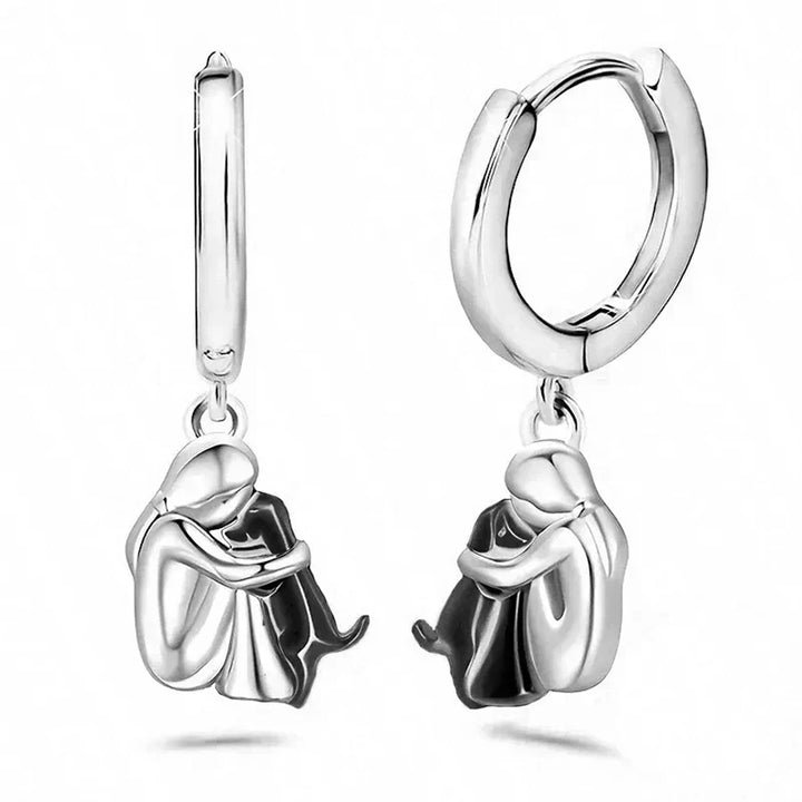 Margot | Elegant Dog Embrace Silver Huggie Hoop Earrings