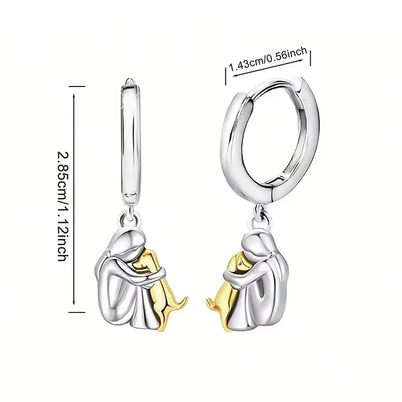 Margot | Elegant Dog Embrace Silver Huggie Hoop Earrings