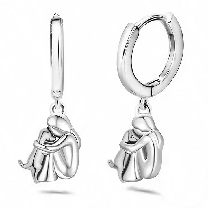 Margot | Elegant Dog Embrace Silver Huggie Hoop Earrings