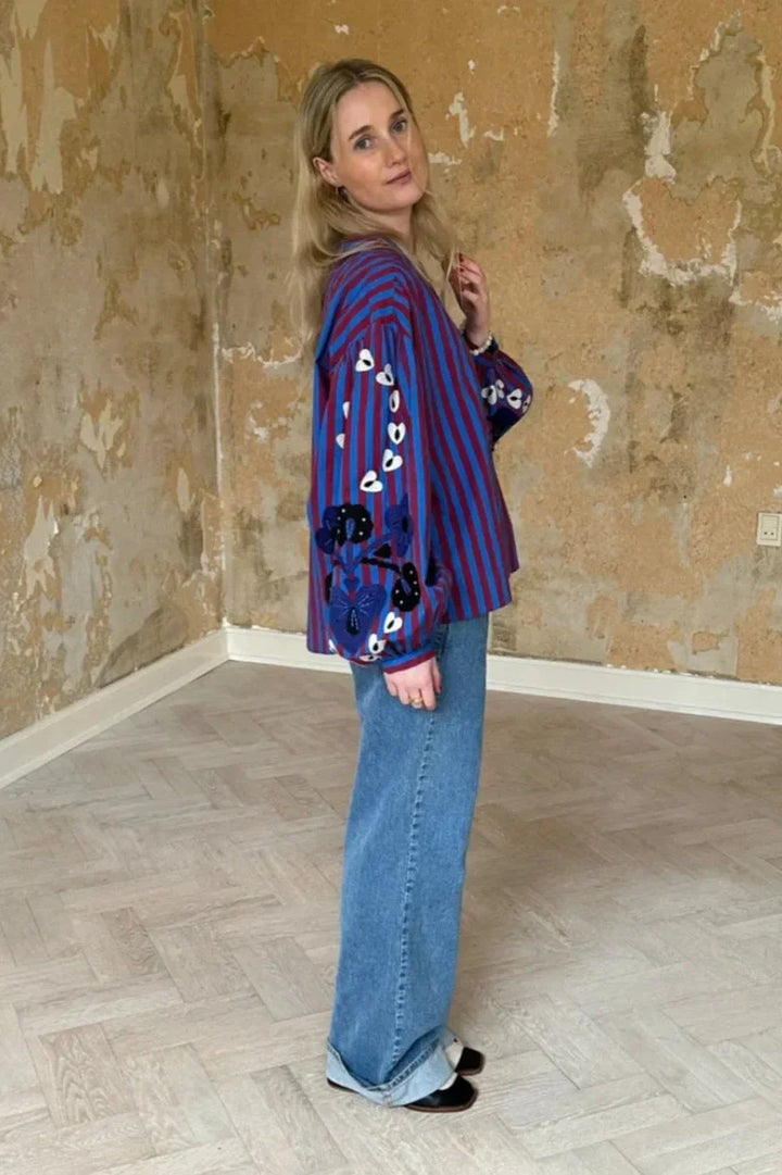 Theodora | Chic Striped Ruffle Blouse With Embroidered Sleeves