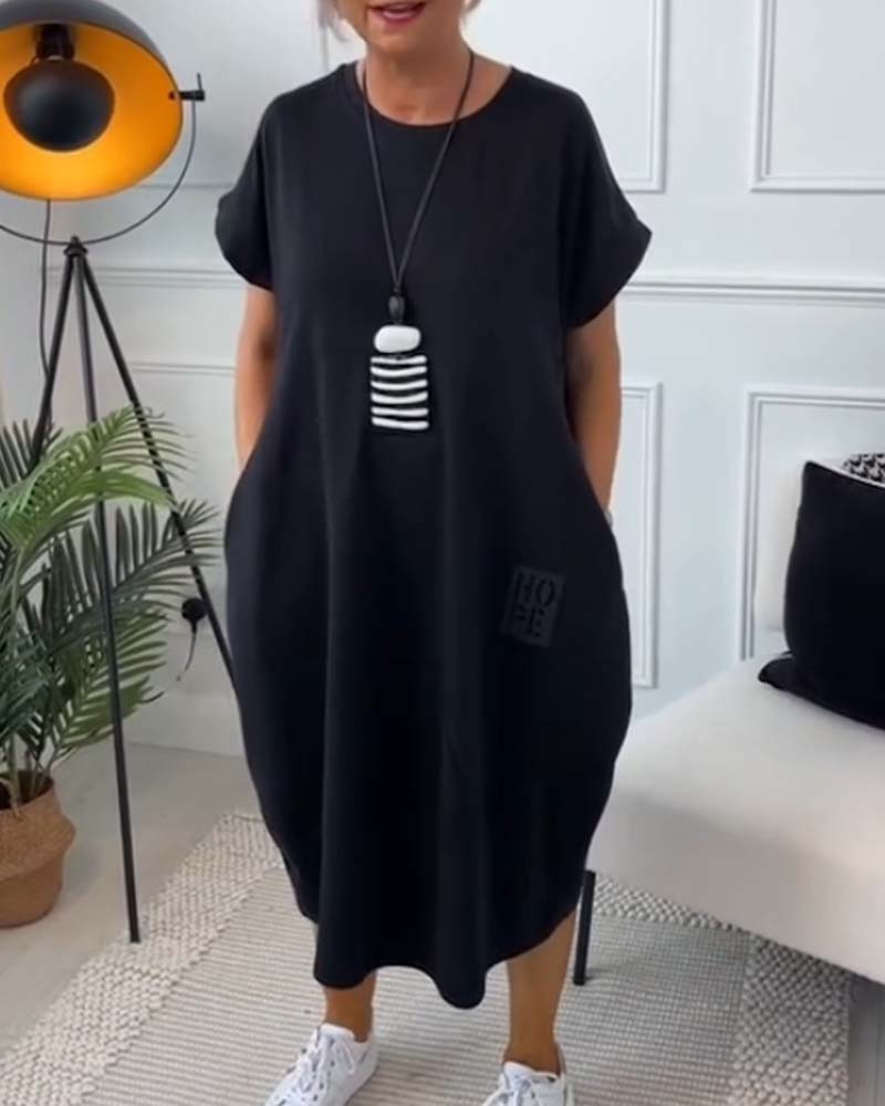 Paige | Effortless Short Sleeve Black Midi Dress With Pockets