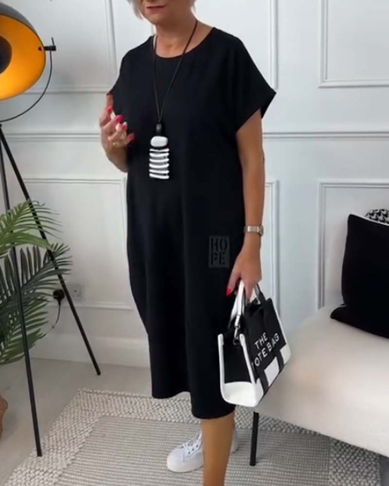 Paige | Effortless Short Sleeve Black Midi Dress With Pockets